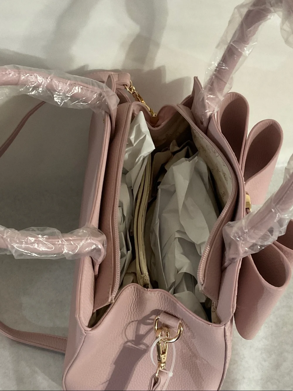 Elegant Pink Bow Satchel with Gold Accent